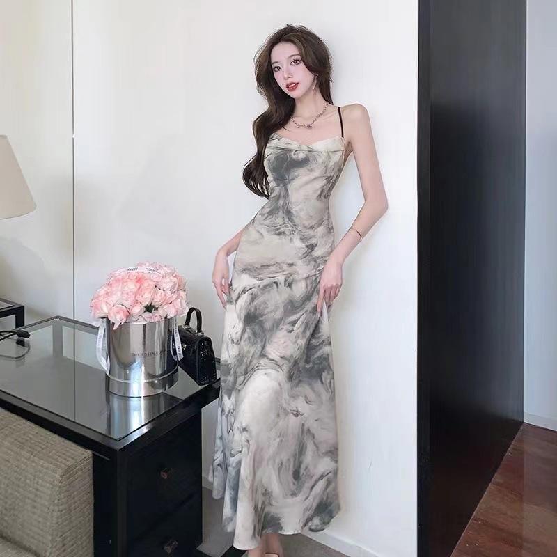 Product Introduction of Elegant Lady High Waist Sling Dress Summer 2025 New French Backless Design Chic Midi Dress 3
