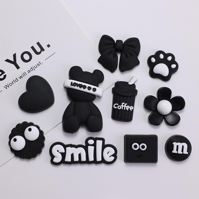Product Introduction of Cartoon Black and White Letter Bear PVC Flexible Glue Accessories Phone Case DIY Hole Shoes Decorative Refrigerator Hairpin Material Stickers 6