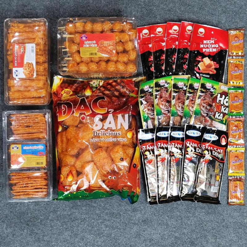 Combo đồ ăn vặt 4 món snack bò quẩy kèm thêm 5 snack nem nướng phên, 5 snack tăm cay đen, 5 snack hổ kaka và 6 snack sườn dê
