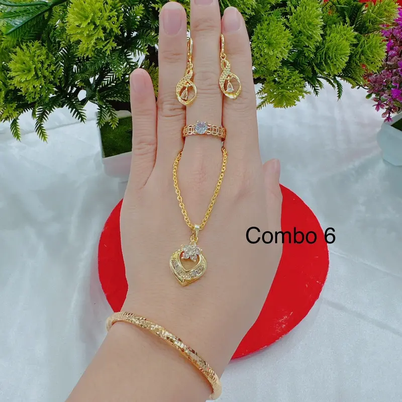 Bộ dây chuyền 4 món dây lắc nhẫn và bông tai( phụ nữ) Cao Su 1