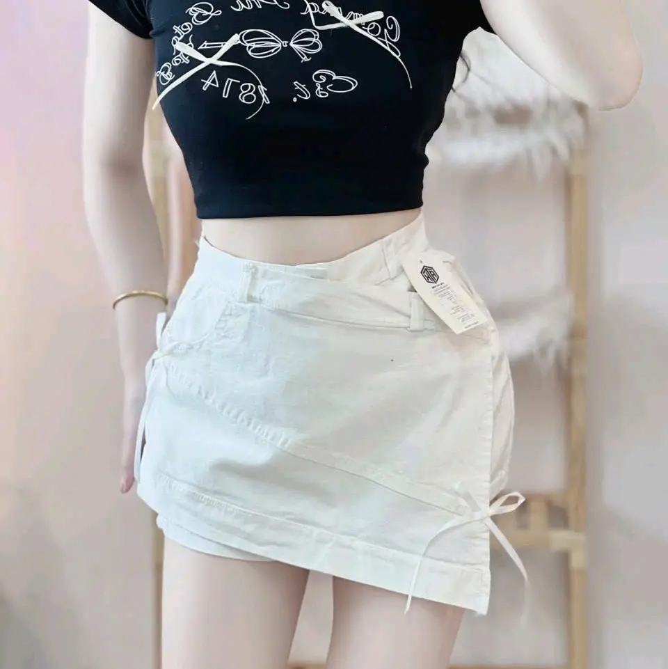 CHÂN VÁY KAKI VẠT CHÉO ĐÍNH NƠ CO GIÃN  Women Nữchân váy vạt chéo sang chảnh