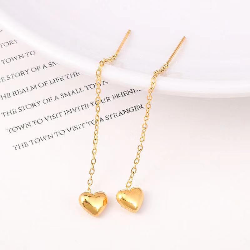 Product Introduction of Titanium steel color preserving solid heart-shaped lines with tassels, peach hearts wrapped in gold, heart-shaped long ear lines, ins, slimming ear chains that highlight the face 2