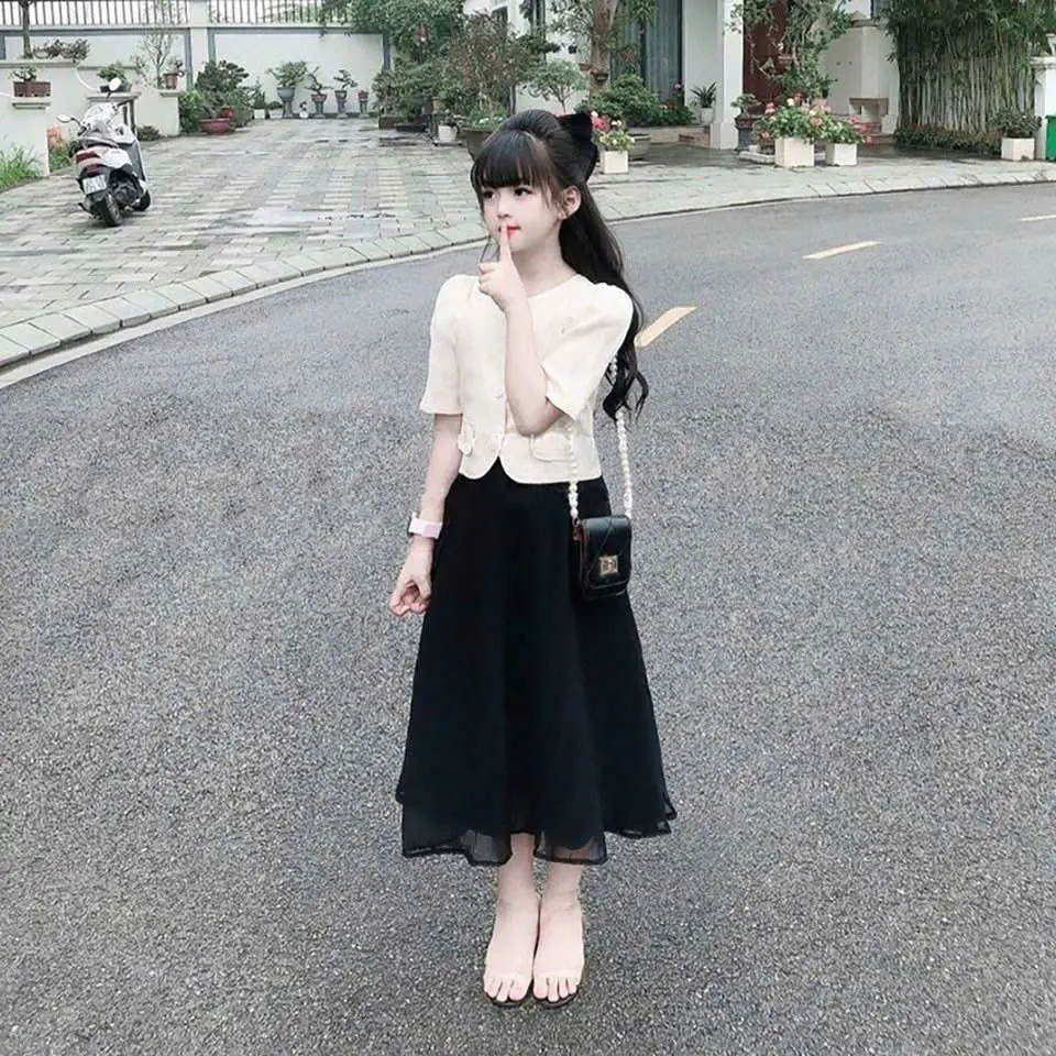 Mã S3: (20 - 50kg) Set áo kiểu vest tay phồng chất cotton lạnh, chân váy dài 2 lớp chất vãi lưới mềm cho bé gái