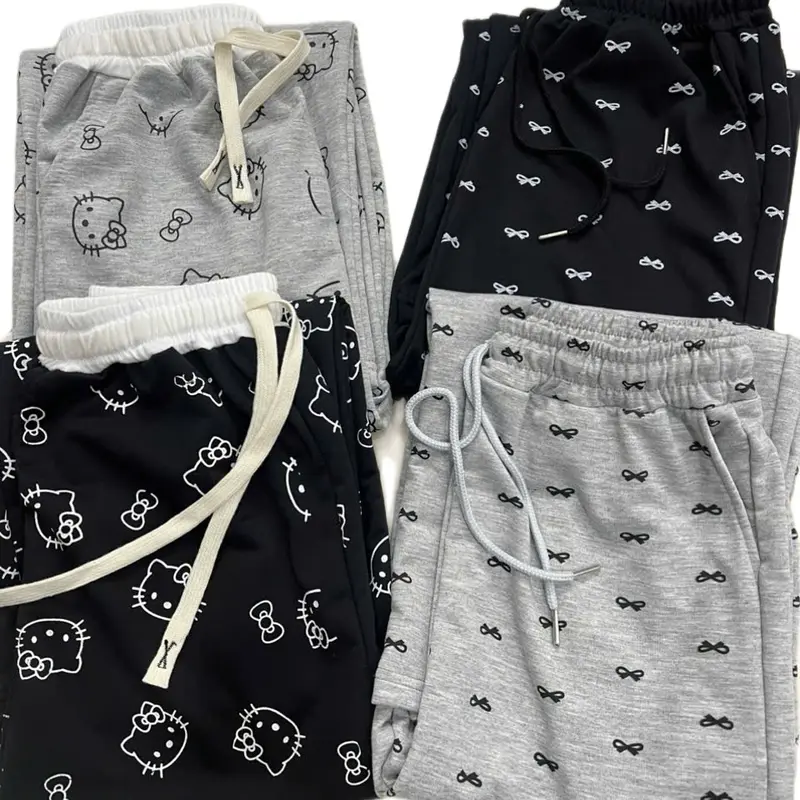 Quần ống suông Nữ họa tiết Nơ,Hello kitty chất vải Da Cá Tàu co giãn đẹp. 1