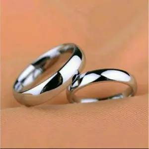 CINCIN TITANIUM ANTI KARAT PRIA WANITA MODEL MATA MUTIARA