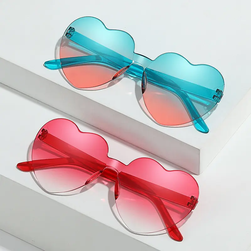 Sunglasses heart peach love sun glasses color jelly frameless heart-shaped glasses a piece of dazzling color sunglasses