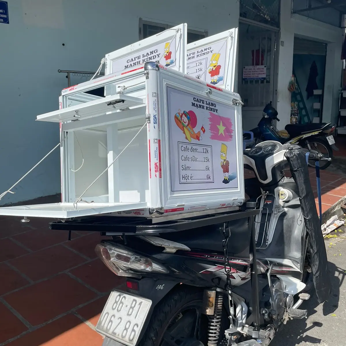 Thùng cafe xe máy Thùng cafe lưu động Thùng cafe di động Thùng cafe mang đi Cafe linh động Thùng cà phê lưu động Thùng cà phê xe máy Cà phê di động Cà phê gấp gọn Xe máy cafe Xe máy cà phê Thùng cafe lắp ráp