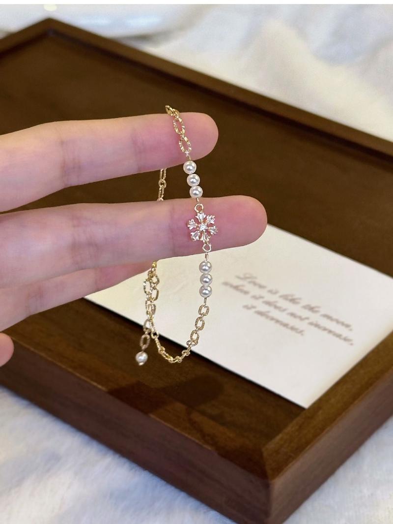 Product Introduction of Vòng Tay Ngọc Trai Zircon Bông Tuyết, Thiết Kế Tối Giản, Thích Hợp Cho Mùa Thu Và Mùa Đông, Độc Đáo, Cao Cấp, Tongqin, Nhẹ Nhàng Và Tinh Tế, Phong Cách Thanh Lịch, Dành Cho Nữ 5