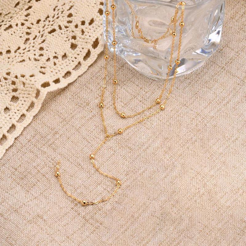 Product Introduction of Europe and America Cross Border Fashion Simple Y-Shaped Necklace All-Matching Graceful Tassel round Beads Multi-Layer Twin Clavicle Chain Chest Necklace Female 9
