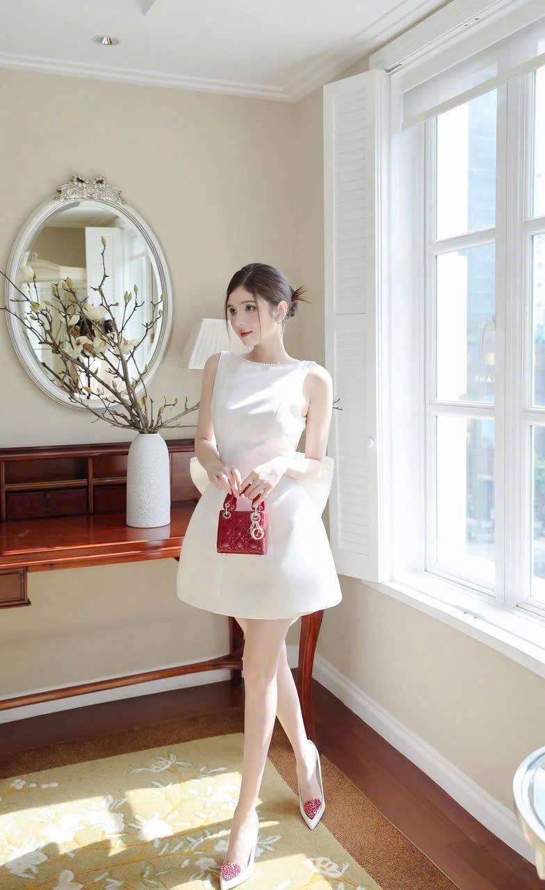 Product Introduction of ( Sam’s Clothing ) Đầm nữ hở lưng đính nơ to viền dây ngọc dáng ngắn xinh xắn Women 14