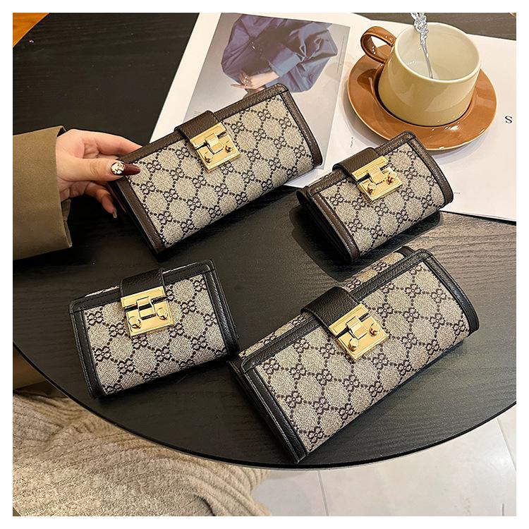 Product Introduction of Ladies' Short, High Appearance, Multi Slot, Three Fold Buckle, Hand-held Long Wallet 20