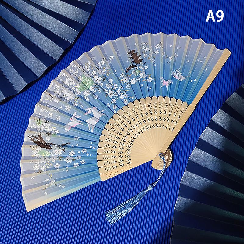 Product Introduction of พัดลมพับ สไตล์จีนโบราณ พัดลมมือไม้ไผ่ ก้านไม้ พัดลมเต้นรำคลาสสิก มีพู่ สง่างาม เหมาะสำหรับผู้หญิง ของตกแต่งบ้าน 31