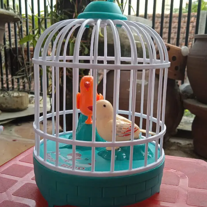 Đồ chơi lồng chim cho bé . lồng chim hót có nhạc và cảm biến phát tiếng kêu khi rung động Kem Voi
