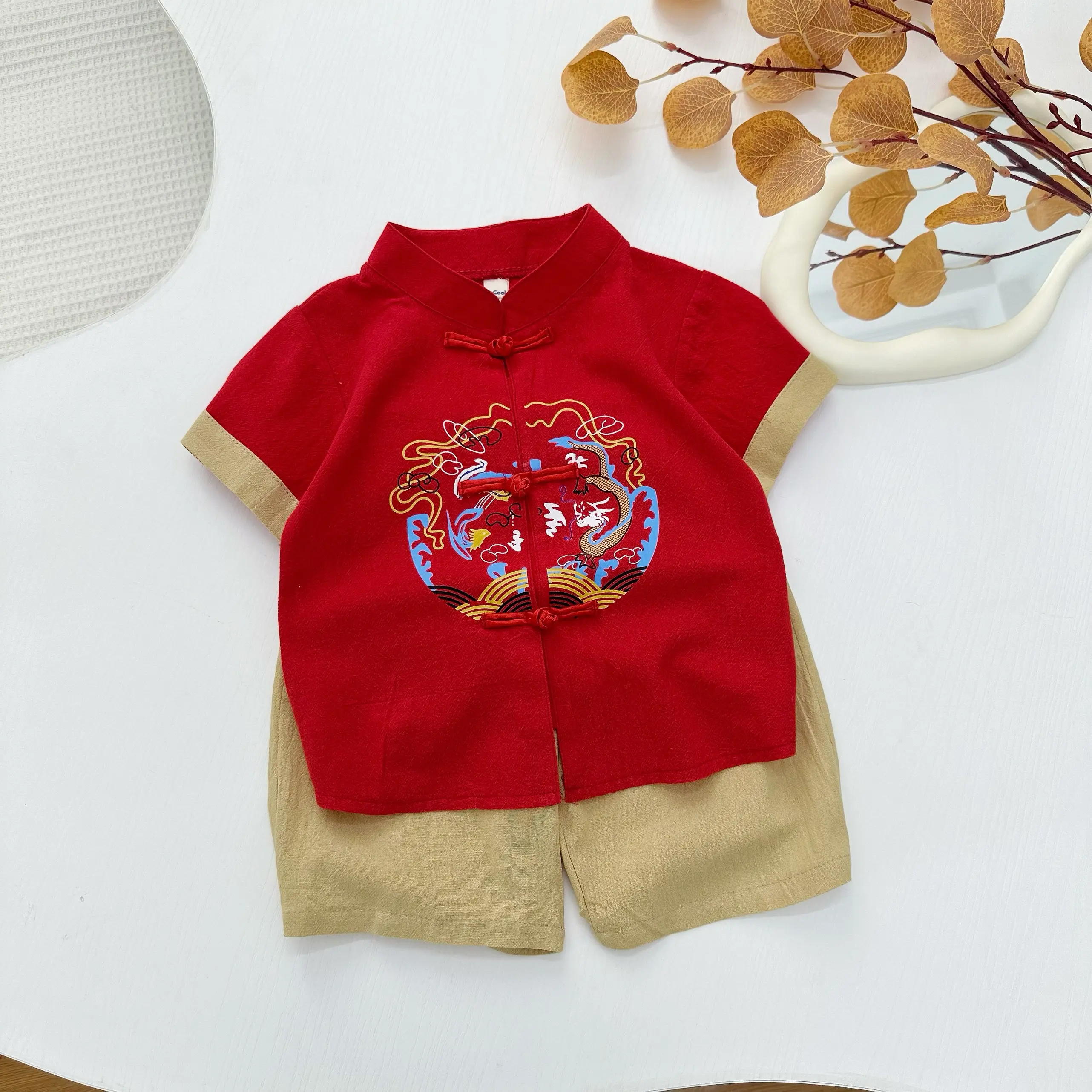 BỘ quần áo cộc tay in hình rồng phượng ,lân cho bé.sét đồ mặc tết chất đũi cao cấp cho bé từ 9-27kg