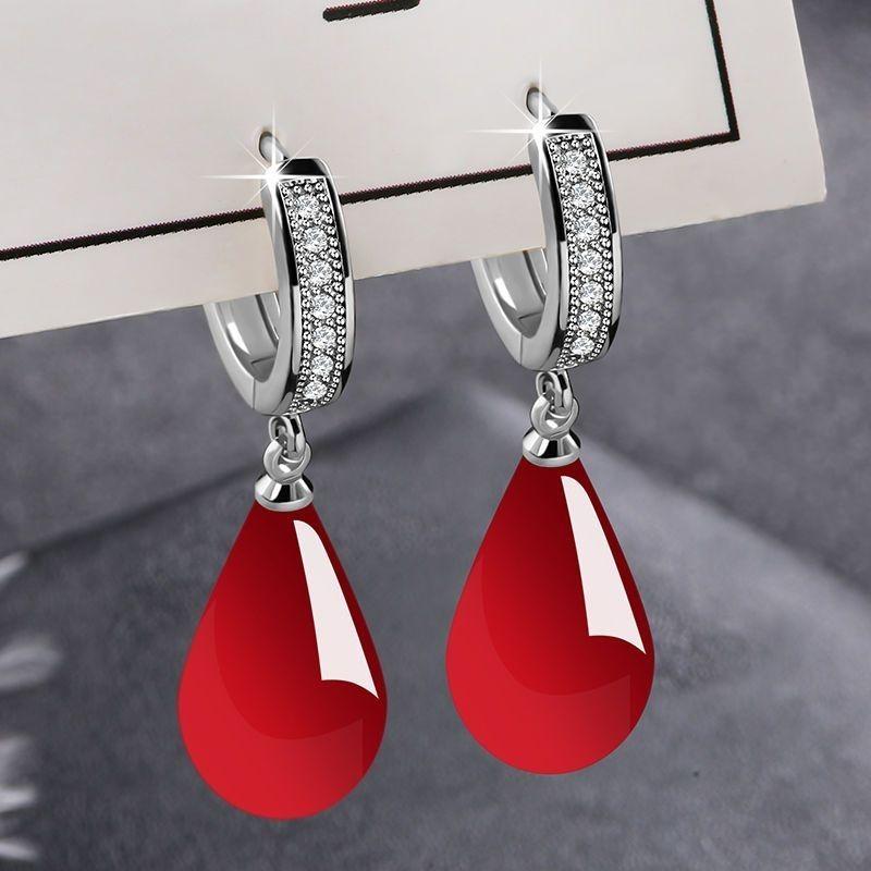 Product Introduction of New Year Style Amber Earrings Ancient Style Cheongsam Amber Earrings Pure Natural Elegant High-end Women's Earrings Autumn Winter 2