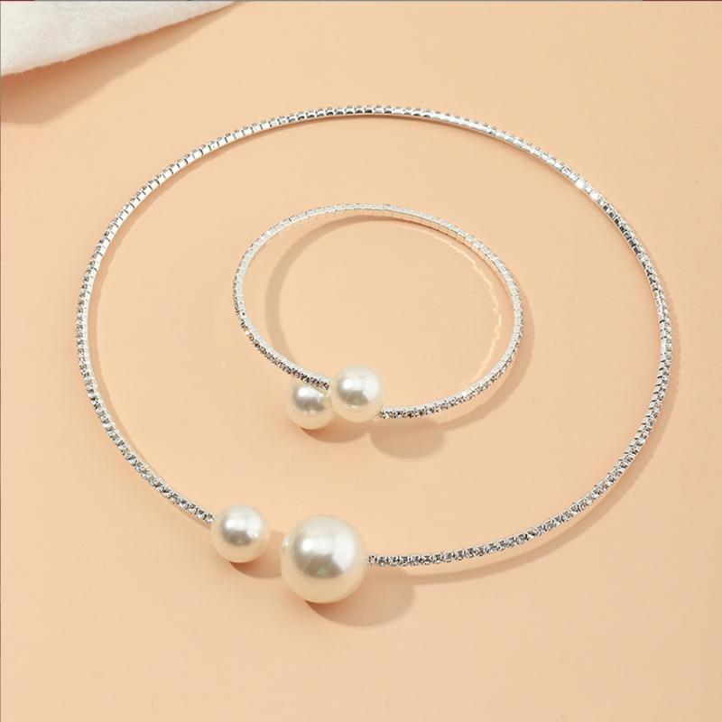 Set dây chuyền vòng cổ vòng tay và nhẫn ngọc trai nhân tạo màu trắng đính đá zircon dạng kiềng dẻo phong cách hàn quốc cá tính