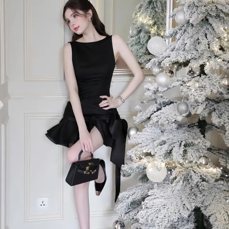Đầm umi sát nách dáng ngắn đính nơ lệch 5