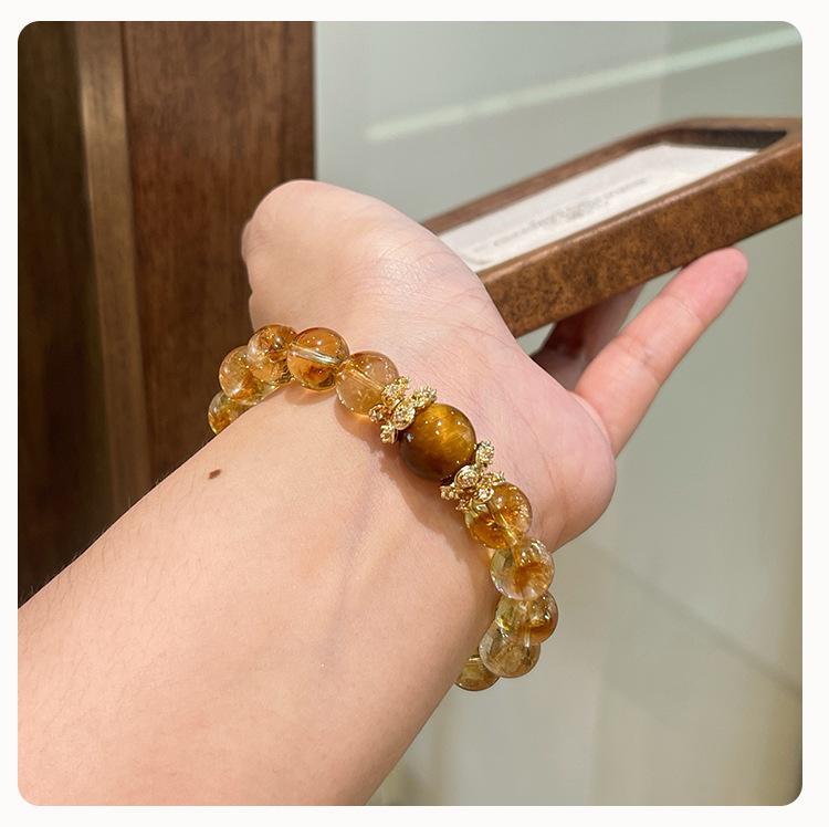 Product Introduction of Natural Yellow Pagoda Crystal Tiger Eye Stone Unique Niche Wealth-Attracting Bracelet for Women Large Round Beads Accessories Wholesale from Manufacturer 5