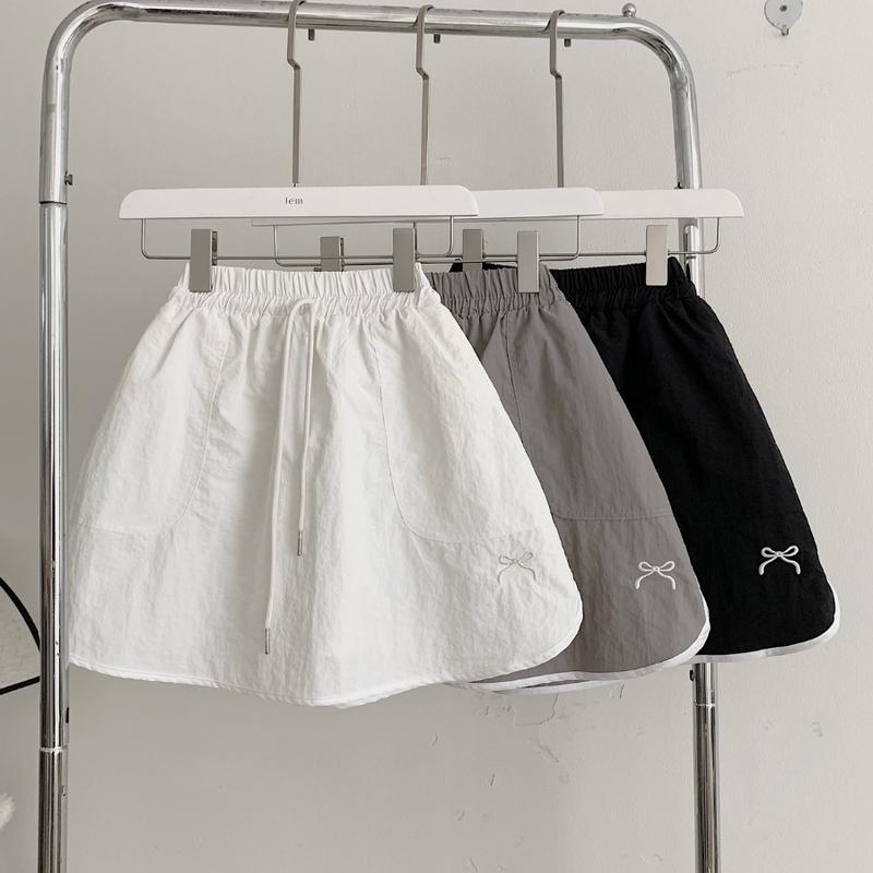 CHÂN VÁY NGẮN CHẤT VẢI DÙ NHĂN HÀN XỊN FORM DÁNG A RỘNG - WERIO - JEMCLOSET 3469