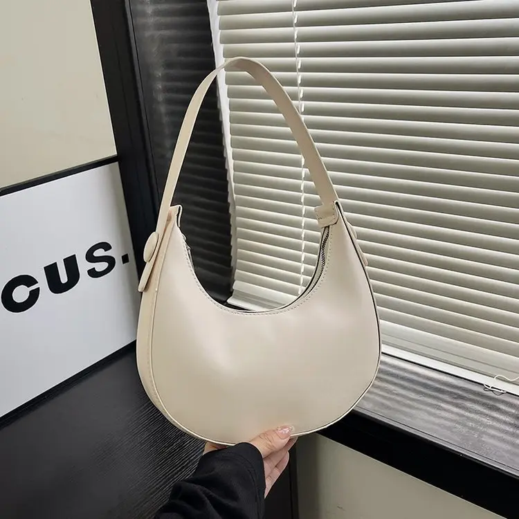 New Underarm Half Moon Bag 2024 Spring Summer Simple Shoulder Bag High-end Baguette Bag Women Niche Design Crescent Bag