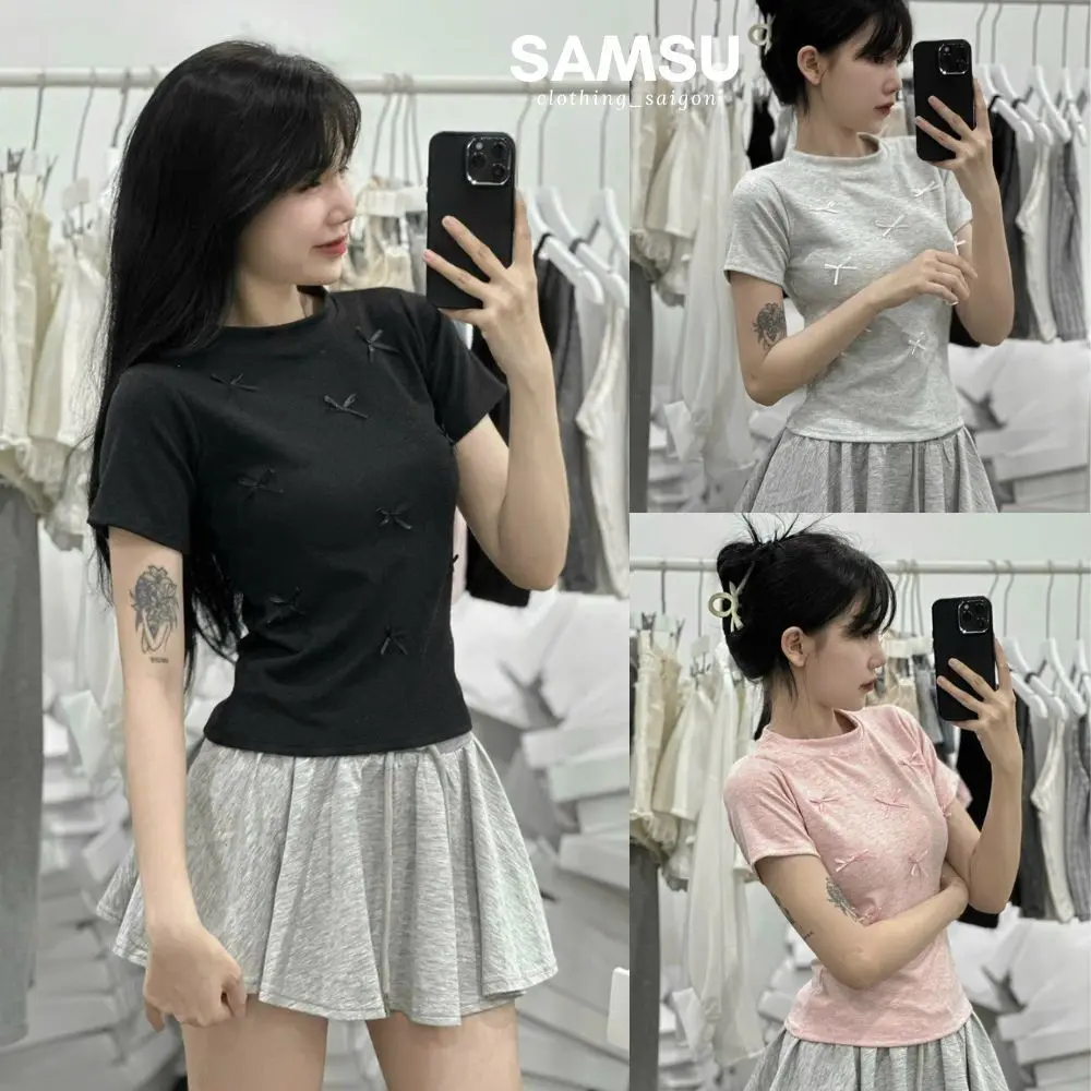 Áo thun baby tee đính nhiều nơ chất cotton co dãn phong cách Hàn Quốc mặc đi học đi chơi Samsu.clothing_saigon Nữ Top Women Cổ Tròn Kem