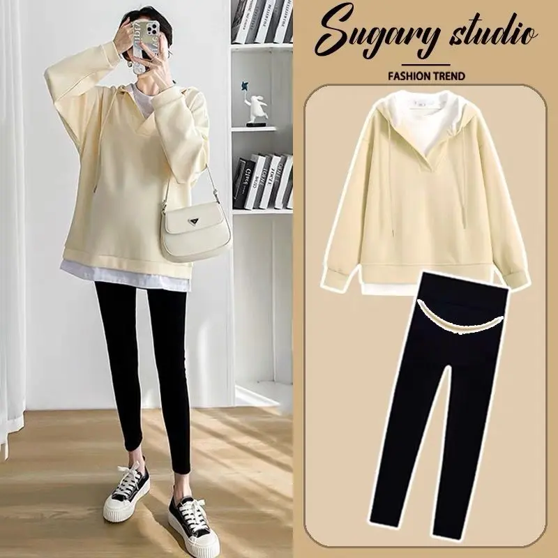 Quần áo bà bầu Áo len mùa thu giấu bụng Bộ đồ thời trang mỏng Phong cách phương Tây nhìn trẻ trung Mùa xuân và mùa thu mới Phụ nữ mang thai đi chơi Bộ hai mảnh