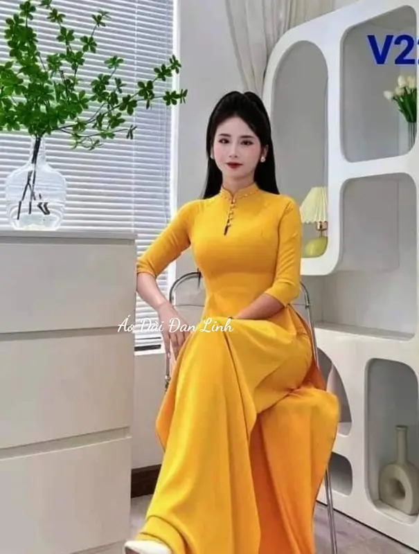 Áo dài vàng kết hoa đính ngọc trẻ trung - Áo Dài Đan Linh 5