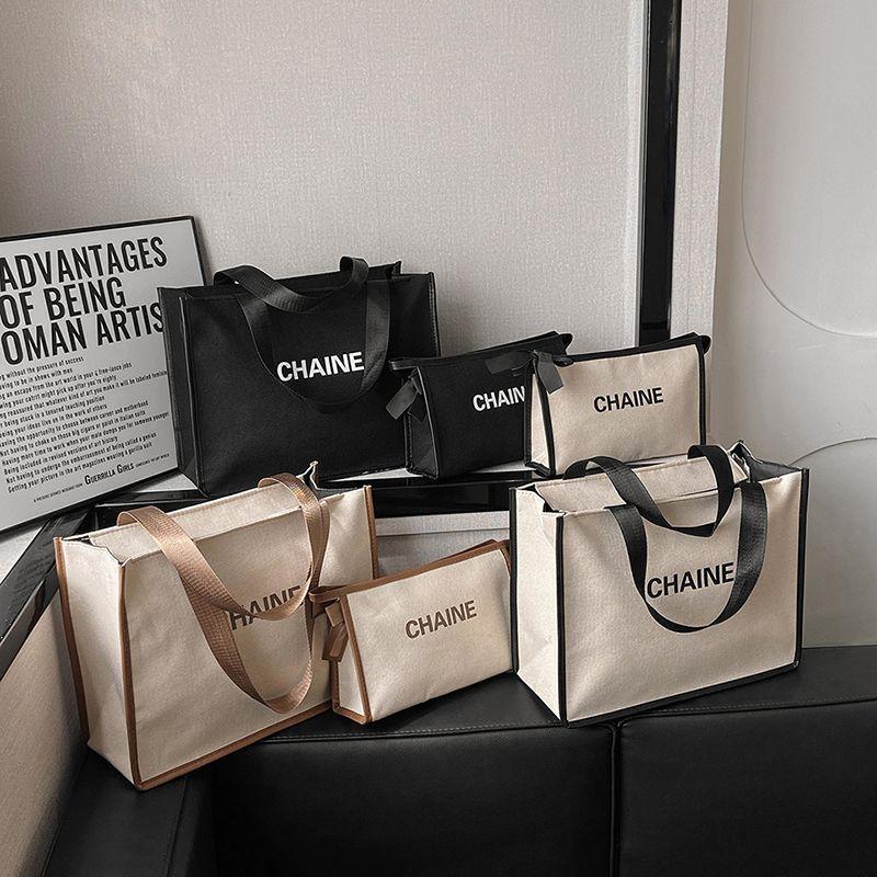  Túi Đựng Mỹ Phẩm Cho Nữ Túi Xách Cầm Tay Mới Dễ Phối Đồ Thích Hợp Đi Du Lịch Túi Đựng Đồ Đơn Giản Dung Lượng Lớn Làm Bằng Vải Bố Ins Túi Đựng Mỹ Phẩm 