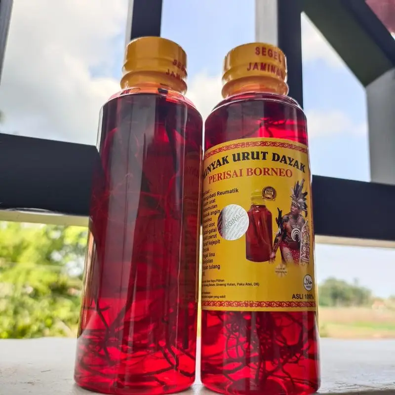 MINYAK URUT DAYAK KALIMANTAN IBU IDA 250 ML Minyak Pijat gosok 6