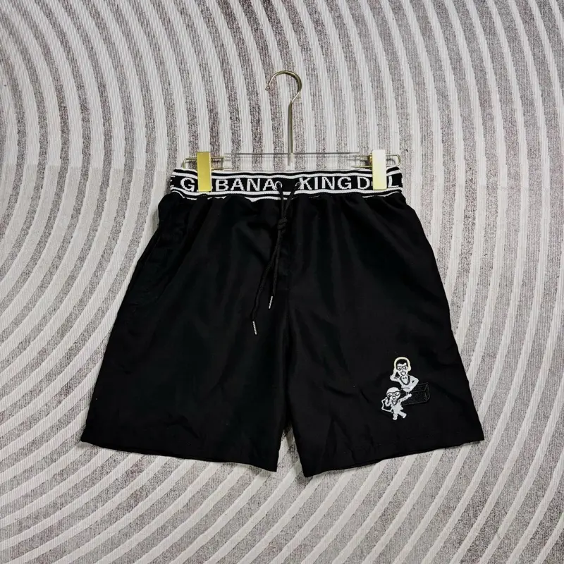 Quần cộc cạp trắng hai hình người chất thun lạnh dành cho nam nữ from unisex