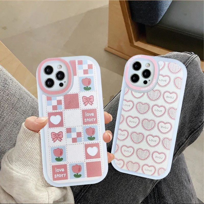 เคสไอโฟนลายโบว์หัวใจสีชมพูครอบเลนส์