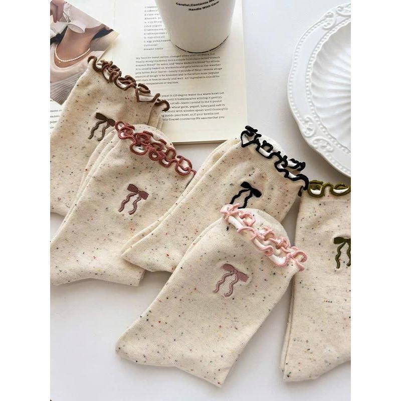  Set 20 đôi tất cổ trung nữ màu tiêu phối họa tiết nơ phong cách Hàn Quốc thiết kế mới mẻ và độc đáo cho nữ 