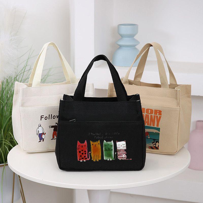 Product Introduction of New Canvas Handbag Large Capacity Simple Office Worker Student All-Match Lunch Box Mummy Work Bento Canvas Bag 5