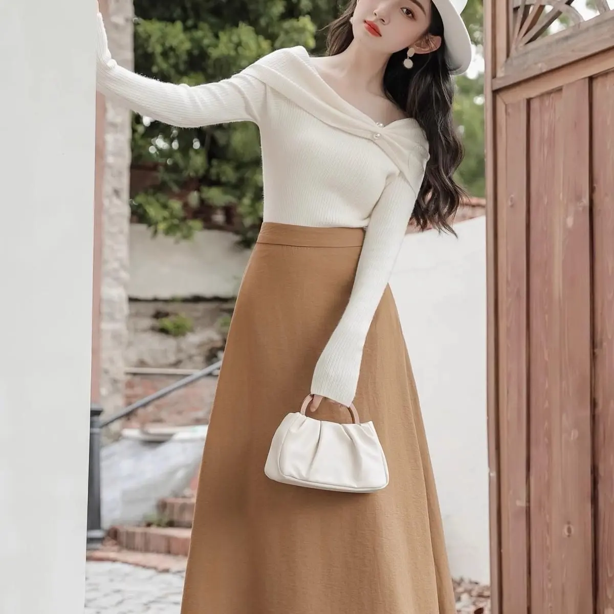 Sét áo len cài Ngọc  chân váy dáng dài