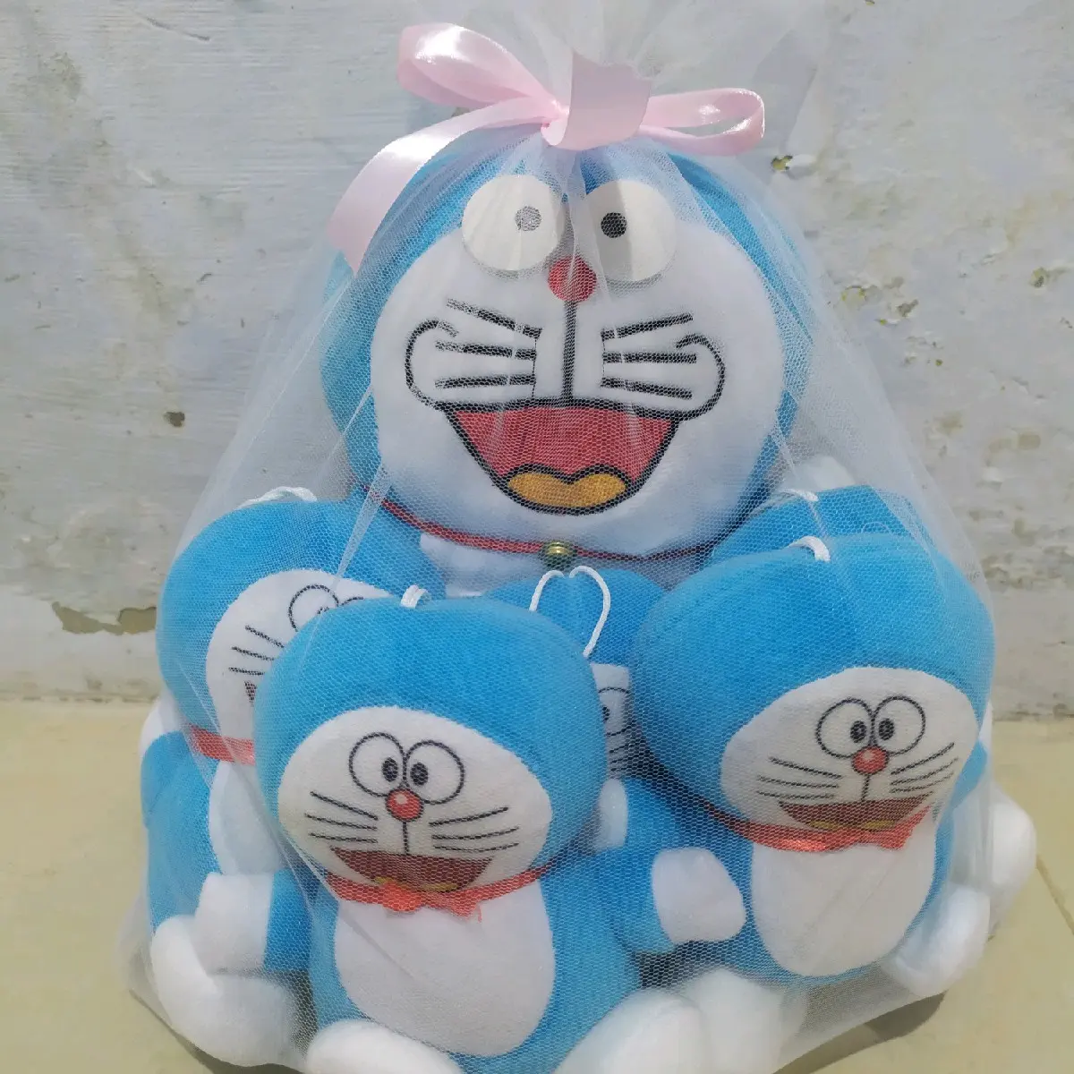 Boneka beranak doraemon