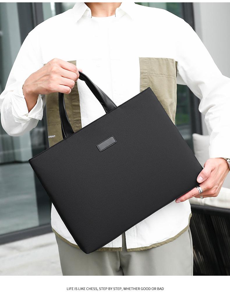 Product Introduction of Travel Essential Solid Color Simple Large Capacity Briefcase New Men's Simple Handbag Multi-layer Storage Business Meeting Laptop Bag 14