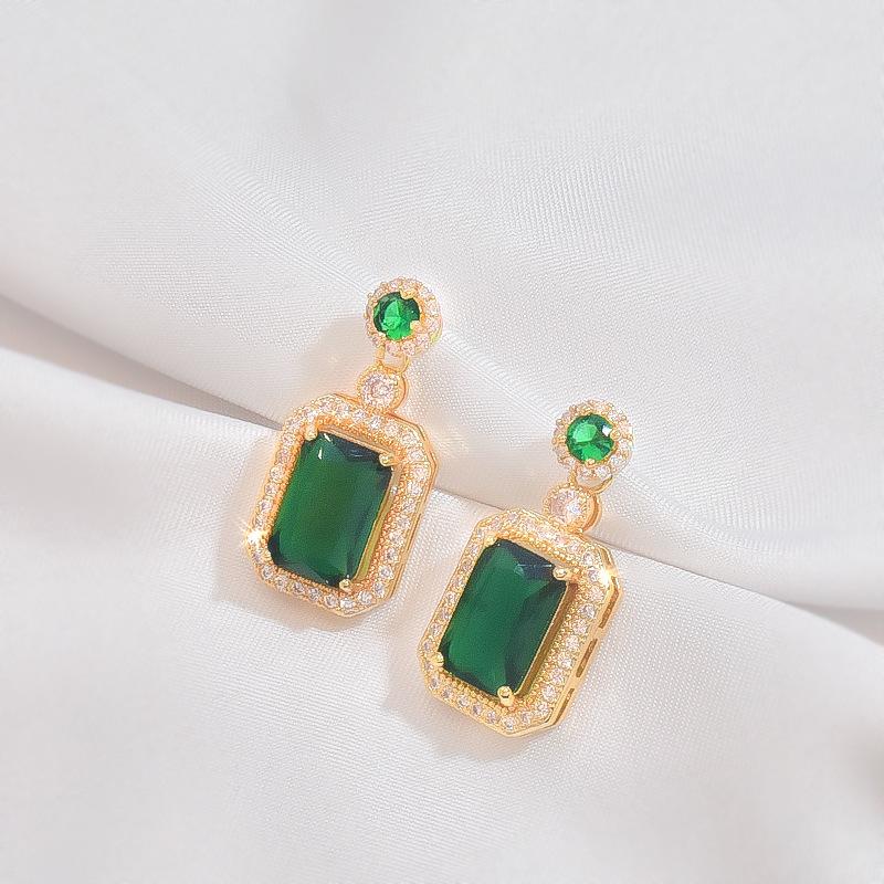 Product Introduction of Emerald Set Necklace Women's High Sense Temperament Entry Lux Fashion New Ring Ear Stud Pendant Three-Piece Set Ornament 8