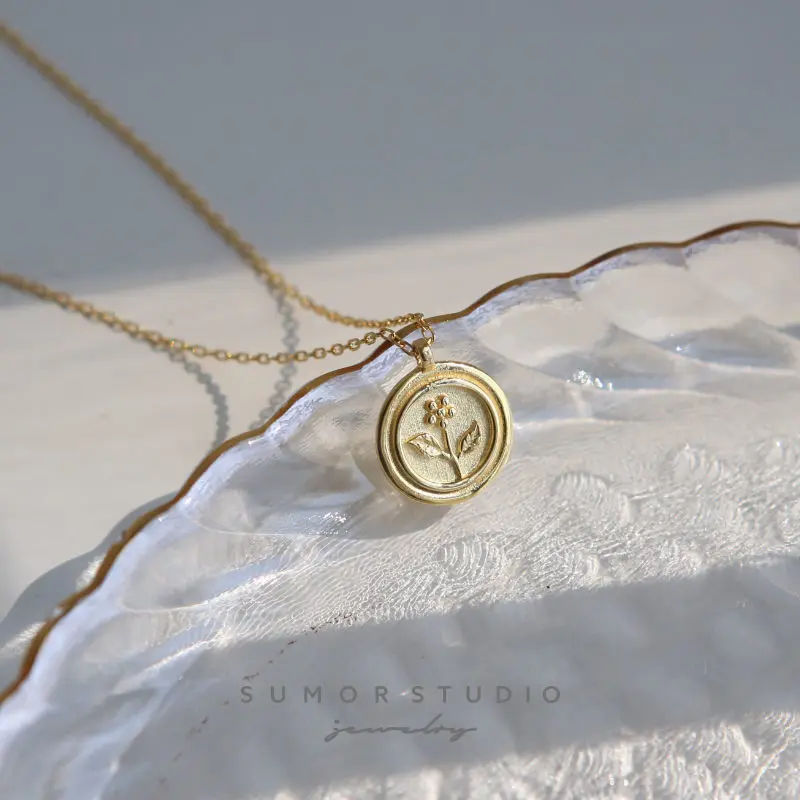 European and American Gold Retro in Fresh Lucky Little Flower round Seal Silver Coin Necklace Clavicle Chain Exquisite