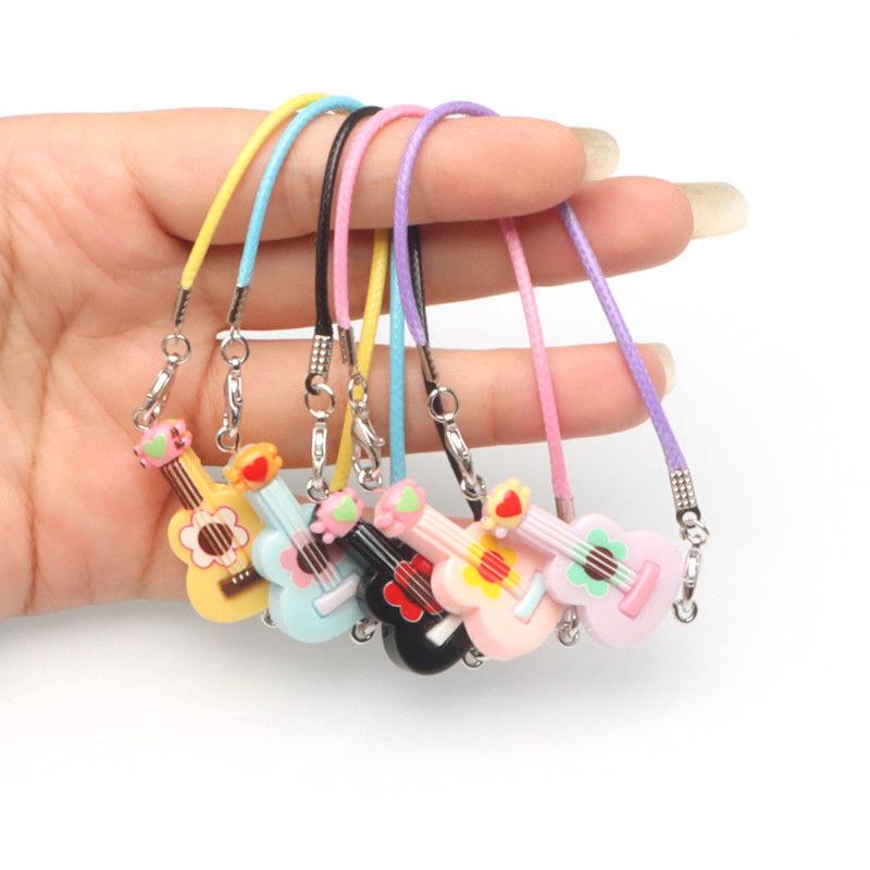 Product Introduction of 20CM Cotton Doll Miniature Realistic Guitar Model: Unleash Your Imagination! Perfect Scene Accessory & Decorative Micro Toy Bell DIY Pendant 7
