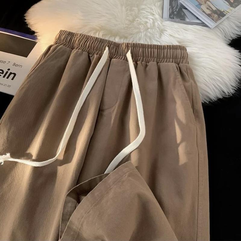 Quần Dài nam nữ ống suông chất vài ka ki mềm mịn cạp chun có dây rút Menswear Thun 8