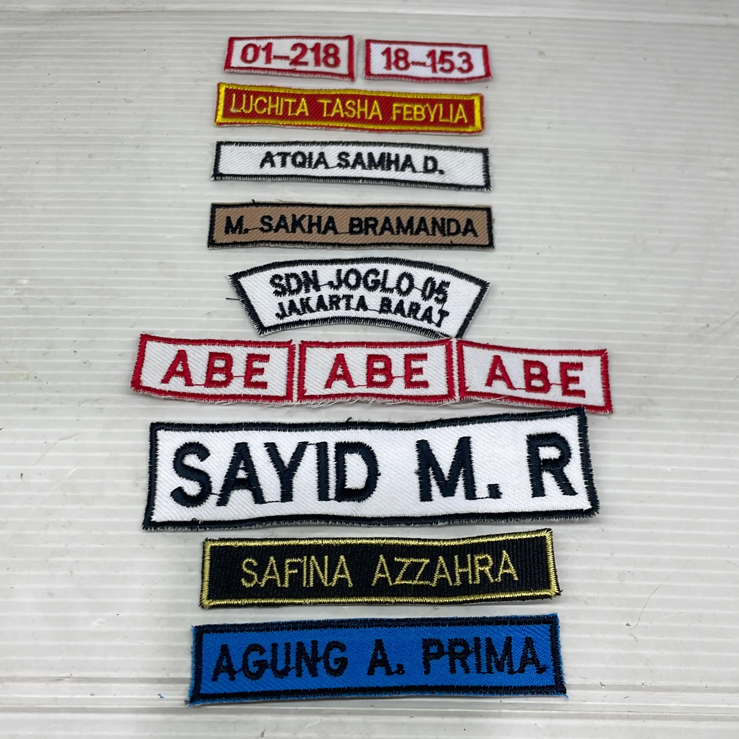 Bet nama Bordir seragam Sekolah/kerja/security/SPBU dll. Satu hari Jadi!