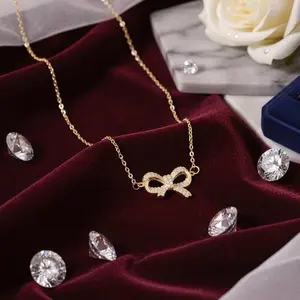 Kalung Pita Berlian Mini  Liontin Pita Manis dengan Taburan Kristal, Desain Feminin & Anggun