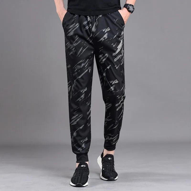 Product Introduction of Autumn Trousers Men Stretch Camouflage Pant Casual Leg Fitting Sweatpants Loose Wear-resistant Trousers 6
