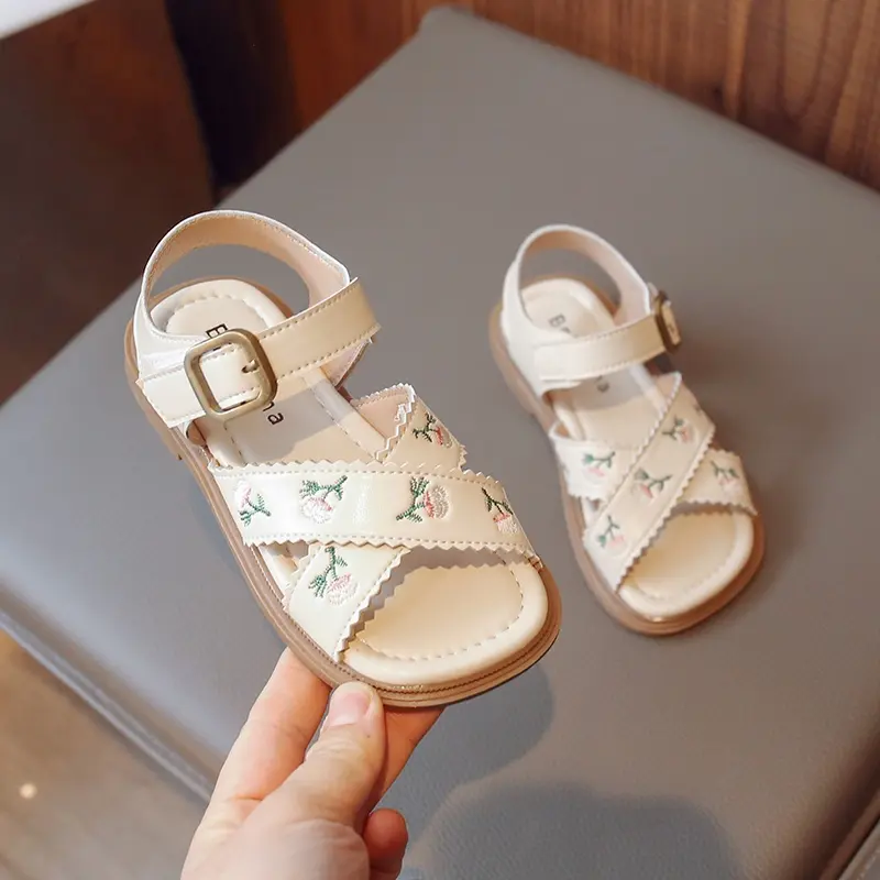 Korean Style Ruffle Girls Cross Strap Sandals Bordir Bunga Kulit Lembut Sol Lembut Sepatu Anak Usia 3-16 Tahun
