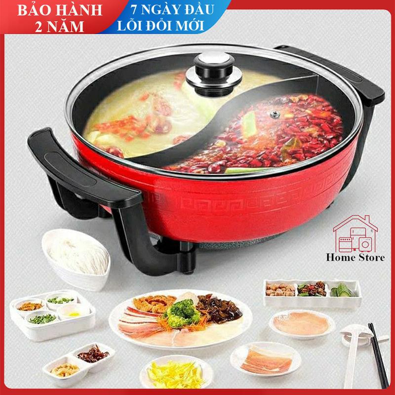 Nồi lẩu điện tròn 2 ngăn chống dính và dẫn nhiệt tốt, nồi lẩu đa năng kết hợp nhiều khẩu vị chỉ trong 1 chiếc nồi. Bảo hành 2 năm, 1 đổi 1 trong 7 ngày đầu nếu có bất kỳ sai xót nào đến từ nhà cung cấp. Nấu Ăn