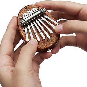 Piano de pulgar mini de 8 teclas, piano de pulgar portátil de 8 tonos, instrumento musical para niños y adultos, juguete musical divertido, regalo de cumpleaños para amigos y niños
