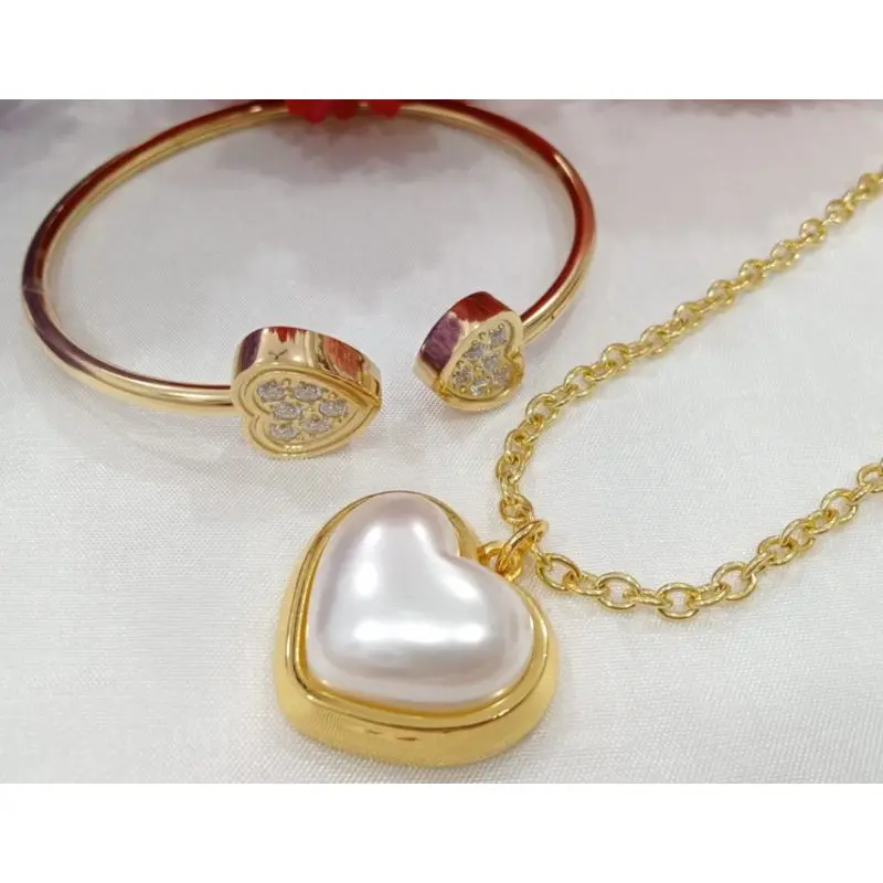 1 Set kalung Gelang Pria Wanita Terbaru W-102 1