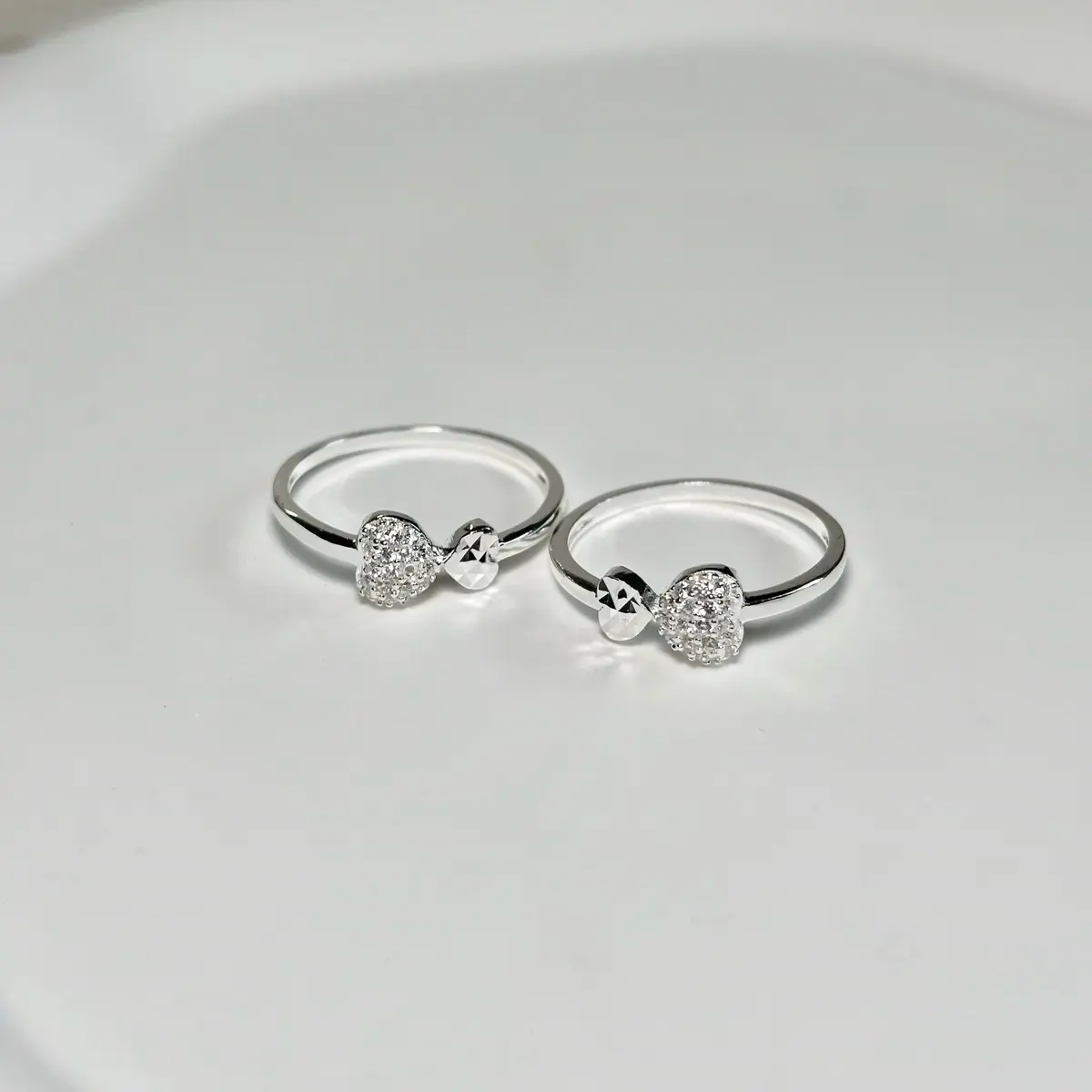 Nhẫn bạc nữ 2 tim đối xứng 1 tim đá tấm 1 tim cắt máy 3D trẻ trung năng động DD Jewelry N002