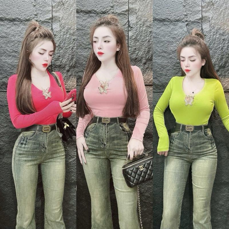 Áo thun tay dài cổ khoét sâu cài 2 con bướm.”màu bướm vàng và bướm trắng tuỳ lô hàng”chị nào thích màu nào có thể nt ghi chú để e đổi