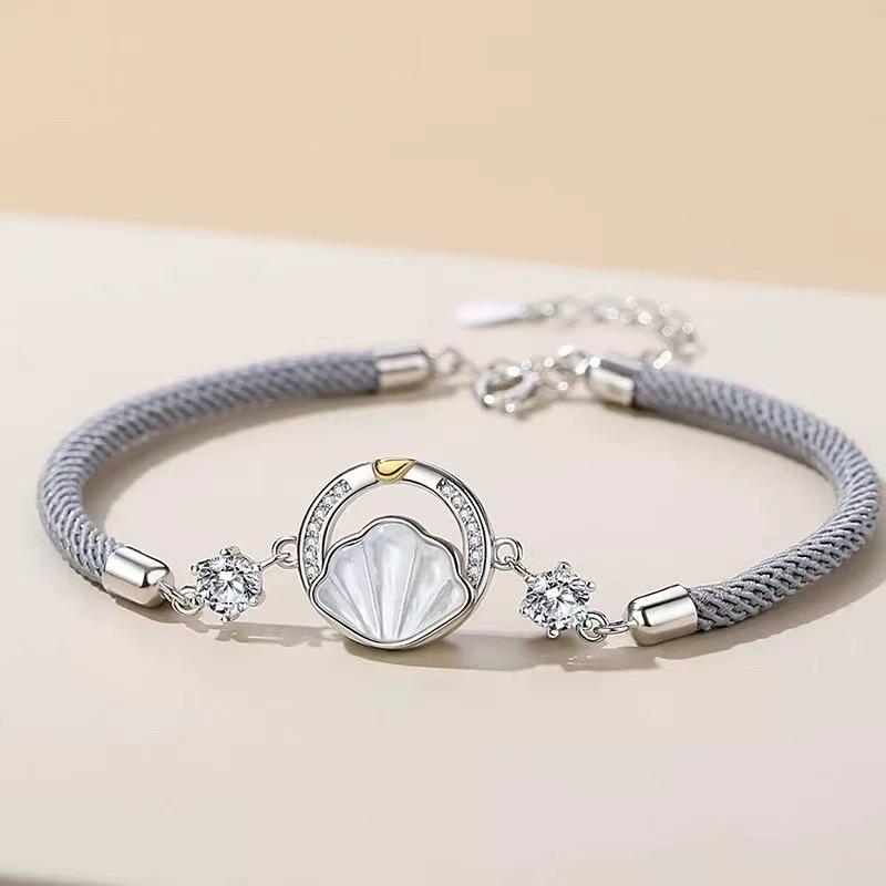 Product Introduction of Whale shell couple bracelet set, handwoven wristbands for men and women, perfect gift for Valentine's Day, long-distance lovers, and a trendy, unique new style in the ins fashion. 4